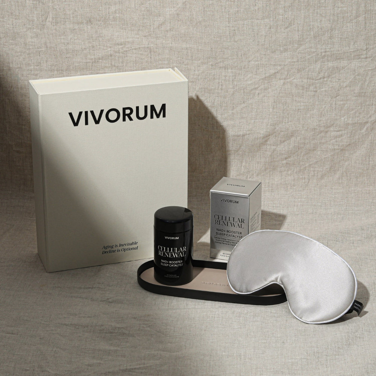 Vivorum product set with a box, bottle, and eye mask on a neutral background