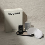 Vivorum product set with a box, bottle, and eye mask on a neutral background