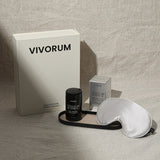 Vivorum product set with a box, bottle, and eye mask on a neutral background